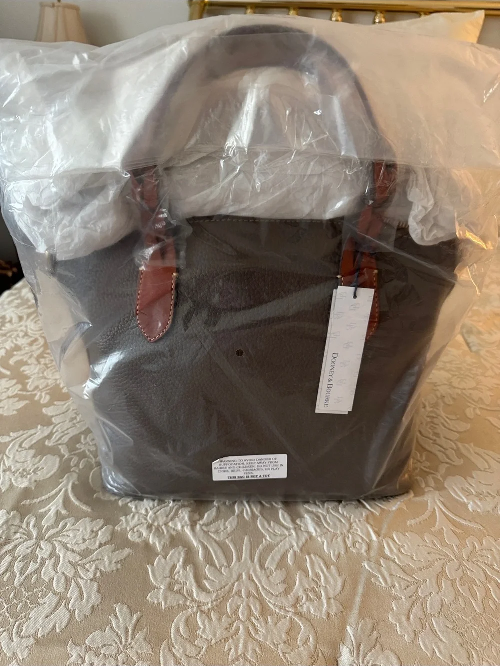 Dooney & Bourke Brown Leather Messenger with Tan Braided Handles